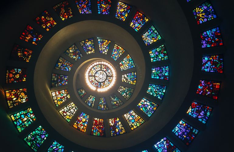 decorative image. Spiral of stained glass windows.